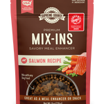 A package of Supreme Source Premium Mix-Ins with a salmon recipe. The product is marketed as a savory meal enhancer and is placed against a white background.