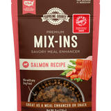 A package of Supreme Source Premium Mix-Ins with a salmon recipe. The product is marketed as a savory meal enhancer and is placed against a white background.